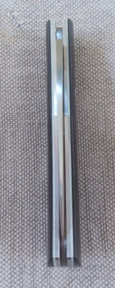 Rhidian Shadow Native...Black Linen micarta. .Cpm154..4" cld..white liners and white Shield.. coa