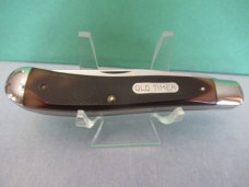 Schrade Rough Saw Cut Delrin USA Made Gunstock LinerLock Trapper Model 194OT