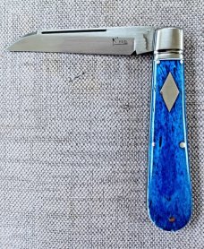Kroo Blue Kudu Bone Lambsfoot,4" closed, Rwl34,white liners & spacers diamond shield.fileworked 