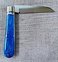Kroo Blue Kudu Bone Lambsfoot,4" closed, Rwl34,white liners & spacers diamond shield.fileworked 
