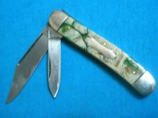 VINTAGE GAMBLE STORES FANCY HANDLE FOLDING SERPENTINE JACK PEN POCKET KNIFE KNIVES OLD GREEN MARBLE