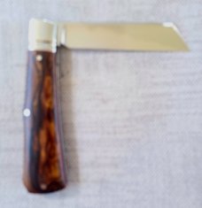 K'roo Custom Jackal Knife,,3.75..Desert Ironwood...rwl34. Filework..red G10 spacers/liners..coa/slip