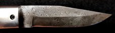 White Linen Micarta with damascus fighting blade, filework 