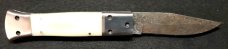 White Linen Micarta with damascus fighting blade, filework 