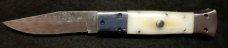 White Linen Micarta with damascus fighting blade, filework 