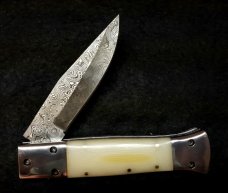 White Linen Micarta with damascus fighting blade, filework 