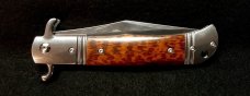 Original CZ Czech Hidden Release knife in rare Snakewood handles.