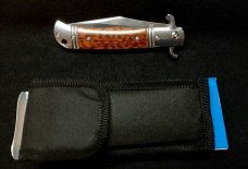 Original CZ Czech Hidden Release knife in rare Snakewood handles.
