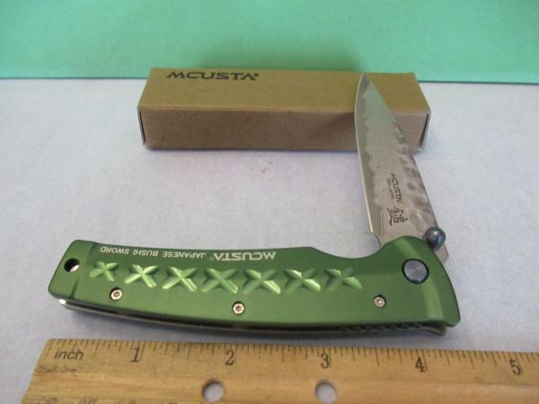Mcusta Green Anodized Aluminum Liner Lock Damascus Model # MC-0163D Mcusta Green Anodized Aluminum Liner Lock Damascus Model # MC-0163D