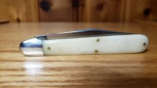 Great Eastern Cutlery 65 Ben Hogan Smooth White Bone Knife New, Mint Condition with Tube and button.
