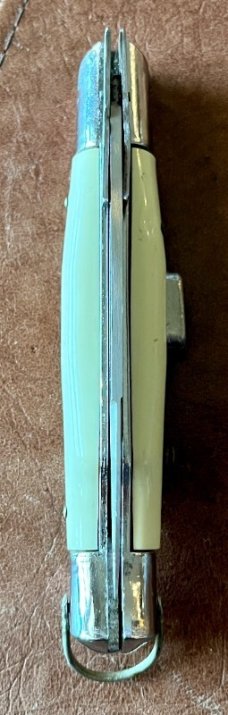 Rare Rizzuto Estileto Milano, White Handle, Wasp Body, Square Button, Mustache Guards 