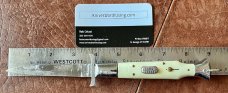 Rare Rizzuto Estileto Milano, White Handle, Wasp Body, Square Button, Mustache Guards 