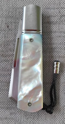Vincenzo Balistreri White Wolf..Mother of Pearl..AEB-L..liners..lanyard pin and bead..coa.slip