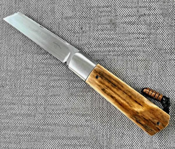 Vincenzo Balistreri Mammoth Ivory White Wolf...4" clsd..440C...Lanyard pin..jimping and filework Vincenzo Balistreri Mammoth Ivory White Wolf...4" clsd..440C...Lanyard pin..jimping and filework