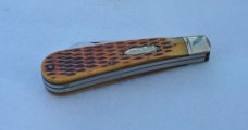 Rough Rider 2 Blade Hawk Jigged Honey Bone Mint 3 7/8" Closed Mirror Polish  Bomb Shield