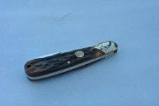 Rough Rider 1 Blade Cotton Sampler Gnarly Honey Handle Mint 4" Closed Mirror Polish Slant Bolster