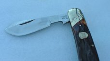Rough Rider 1 Blade Cotton Sampler Gnarly Honey Handle Mint 4" Closed Mirror Polish Slant Bolster