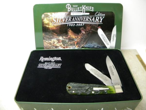 Remington USA R1123 2007 25th Anniv. Bone Silver Bullet Trapper Knife in Tin