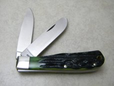 Remington USA R1123 2007 25th Anniv. Bone Silver Bullet Trapper Knife in Tin