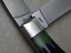 Remington USA R1123 2007 25th Anniv. Bone Silver Bullet Trapper Knife in Tin