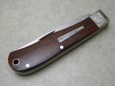 Remington USA R1128 2007 25th Anniv. CocoBola Silver Bullet Trapper Knife in Tin