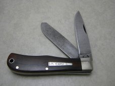 Remington USA R1128-D 2007 25th Anniv. Damascus Silver Bullet Trapper Knife in Tin