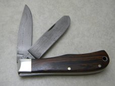Remington USA R1128-D 2007 25th Anniv. Damascus Silver Bullet Trapper Knife in Tin