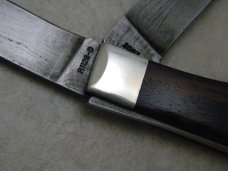 Remington USA R1128-D 2007 25th Anniv. Damascus Silver Bullet Trapper Knife in Tin