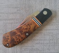 Grayson Jennings Thuya Burl Trapper..Cpm154..Black Canvas Micarta bolsters...3.5 closed..coa and box