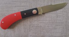 Luciano Silveira Pacheco..14C28N stainless..Red Corian Scales and Black Corian Bolsters...3.75 clsd