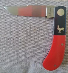 Luciano Silveira Pacheco..14C28N stainless..Red Corian Scales and Black Corian Bolsters...3.75 clsd