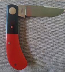 Luciano Silveira Pacheco..14C28N stainless..Red Corian Scales and Black Corian Bolsters...3.75 clsd