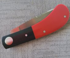 Luciano Silveira Pacheco..14C28N stainless..Red Corian Scales and Black Corian Bolsters...3.75 clsd