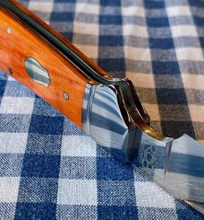 Rosecraft Blades Clinch River Swayback with finger chili in Bourbon Bone