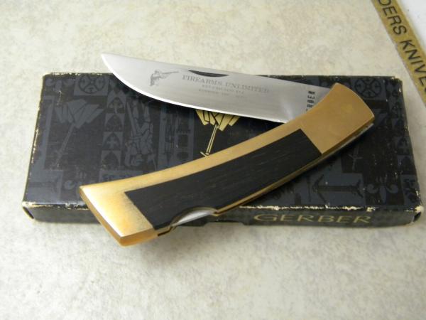 Gerber USA Firearms Umlimited Wood and Brass Lockback Knife NIB Gerber USA Firearms Umlimited Wood and Brass Lockback Knife NIB