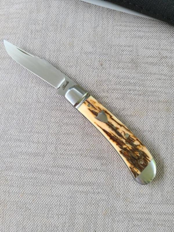Bobby Toole Jigged Mammoth Ivory Honknose Trapper...Cpm154...3 7/8" closed..New...pouch and coa. Bobby Toole Jigged Mammoth Ivory Honknose Trapper...Cpm154...3 7/8" closed..New...pouch and coa.