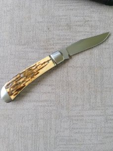 Bobby Toole Jigged Mammoth Ivory Honknose Trapper...Cpm154...3 7/8" closed..New...pouch and coa.