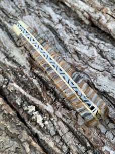 BUCK 110 LEROY REMER CUSTOM BROWN MAMMOTH TOOTH FOLDING HUNTER