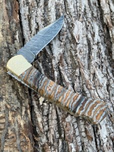 BUCK 110 LEROY REMER CUSTOM BROWN MAMMOTH TOOTH FOLDING HUNTER