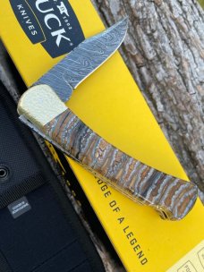 BUCK 110 LEROY REMER CUSTOM BROWN MAMMOTH TOOTH FOLDING HUNTER