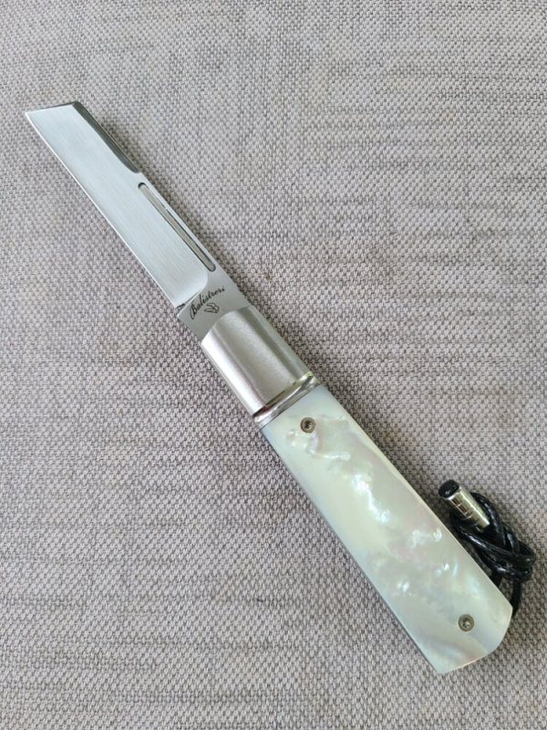 Vincenzo Balistreri White Wolf..Mother of Pearl..AEB-L..liners..lanyard pin and bead..coa.slip