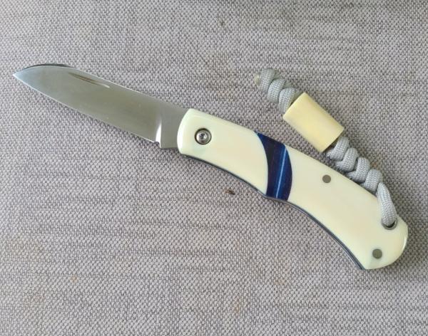 Mhara Native.,N690,..4".coa& box,..Blue G10 inlays....Full Hippo Ivory Scales..lanyard w/ivory bead Mhara Native.,N690,..4".coa& box,..Blue G10 inlays....Full Hippo Ivory Scales..lanyard w/ivory bead