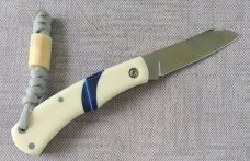 Mhara Native.,N690,..4".coa& box,..Blue G10 inlays....Full Hippo Ivory Scales..lanyard w/ivory bead