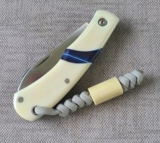 Mhara Native.,N690,..4".coa& box,..Blue G10 inlays....Full Hippo Ivory Scales..lanyard w/ivory bead