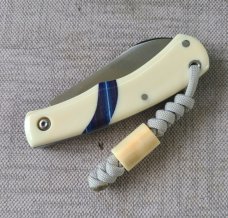 Mhara Native.,N690,..4".coa& box,..Blue G10 inlays....Full Hippo Ivory Scales..lanyard w/ivory bead