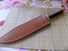 Custom Large Bowie knife unmarked with custom sheath.