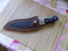 Large Bowie Knife unmarked With original sheath.