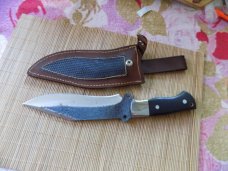Large Bowie Knife unmarked With original sheath.