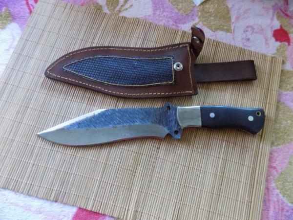 Large Bowie Knife unmarked With original sheath.