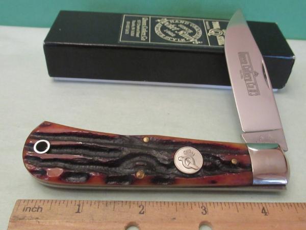 Queen Titusville PA. Amber Carved Stag Bone Mountain Man Pattern # 3